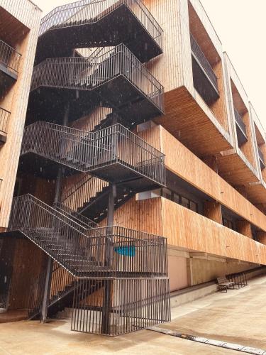 a building with stairs on the side of it at N 406 Kokhta Mitarbi / N 406 კოხტა მიტარბი in Borjomi