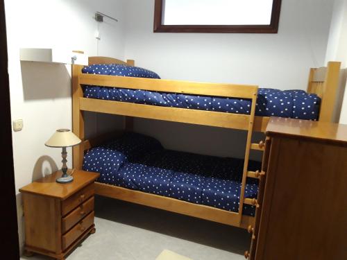Posteľ alebo postele v izbe v ubytovaní ChavesB Apartamento en Vilaxoan de Arousa