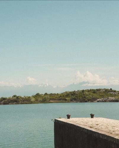 a view of a body of water from a pier at Apartmani Konoba Starčevo in Virpazar