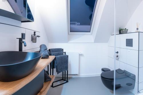 Dapur atau dapur kecil di Waldbewohner Apartments / Fuchs