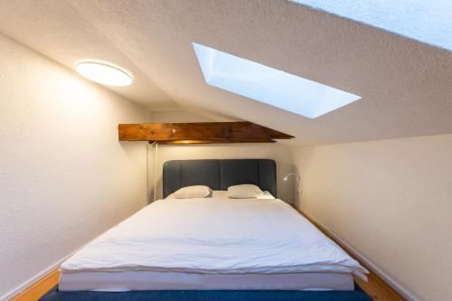 Postel nebo postele na pokoji v ubytování Lúčnica apartments Tále