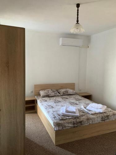 a bedroom with a bed in a room at Sozopol Old Town - Apartment 4 in Sozopol