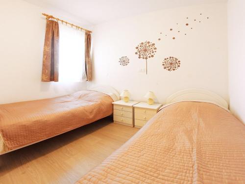 Krevet ili kreveti u jedinici u okviru objekta Apartment Omanović