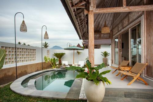 Kolam renang di atau dekat dengan Amaya Sebatu Villa