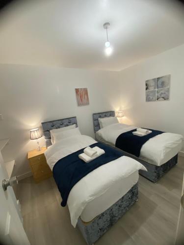 Ein Bett oder Betten in einem Zimmer der Unterkunft Relaxing Modern Apartment, Sheffield, Free Parking