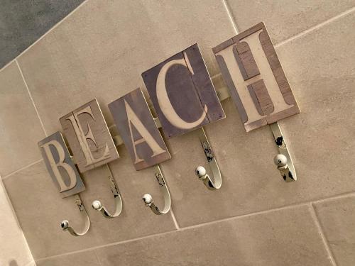 a sign for a bath store on a sidewalk at LHV Garda Lake - Private POOL and SPA in Bardolino