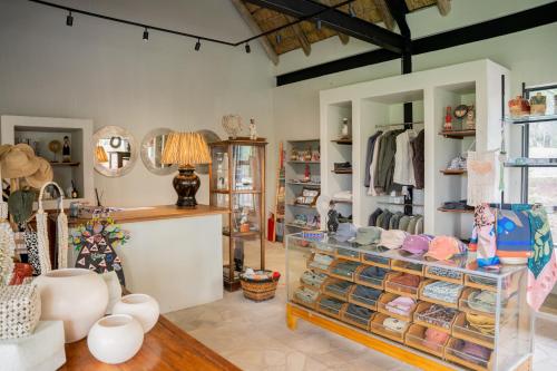a room with a display case filled with clothes at Thornybush Game Lodge in Thornybush Game Reserve