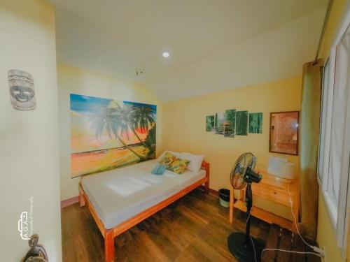 Postel nebo postele na pokoji v ubytování Mecaja Beach House