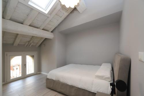Säng eller sängar i ett rum på Loggia del Tenore Suite