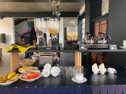 a counter in a kitchen with some food on it at Handagedara Resort & Spa in Mirissa