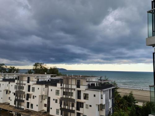 a view of the ocean from a building at Timurbay Treasures Studio Apartment Side Seaview with Wifi Neflix in Kuantan