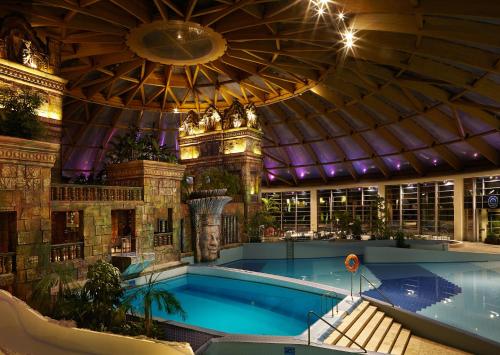 a large swimming pool in a large building at Aquaworld Resort Budapest in Budapest