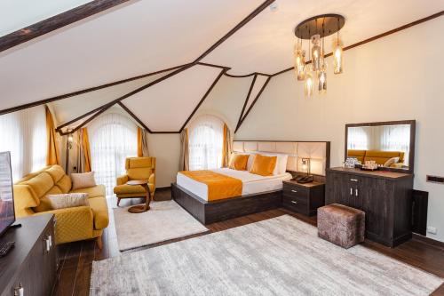 Postel nebo postele na pokoji v ubytování Quba Vadi Chalet Hotel