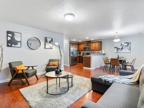 a living room with a couch and a table at No Place Like Home in Vancouver