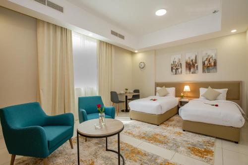 Postel nebo postele na pokoji v ubytování Platinum Coast Hotel Apartments