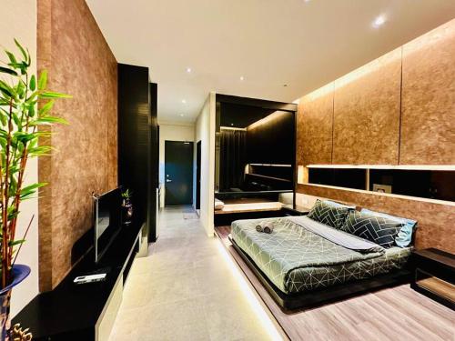 a bedroom with a bed in a room at Montana Suites 3, Empire Damansara in Petaling Jaya