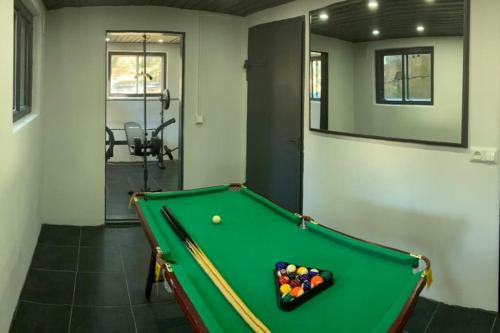 a snooker room with a pool table at Omakotitalo, Raisio (near Meyer gate) in Raisio