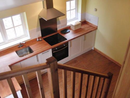 an overhead view of a kitchen with a stove at The Signal Box (Cliburn) in Penrith