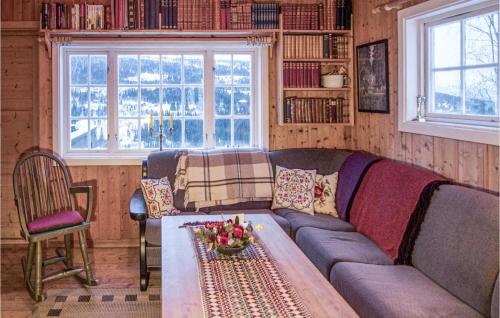 a living room with a couch and a table at 2 Bedroom Stunning Home In len in Ålen
