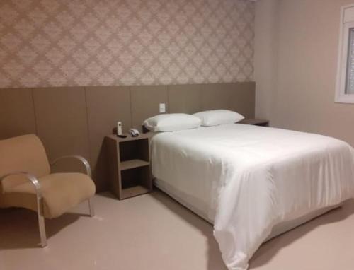 Llit o llits en una habitació de Hotel Seville Comfort