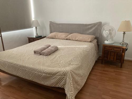 Ένα ή περισσότερα κρεβάτια σε δωμάτιο στο Casa 15 Norte