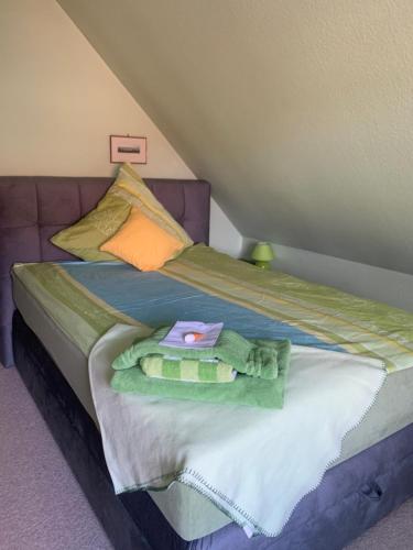 מיטה או מיטות בחדר ב-Privatzimmer Kempen/Nrh.