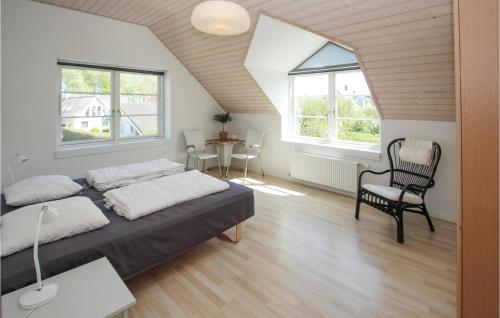 3 Bedroom Gorgeous Apartment In Samsøにあるベッド