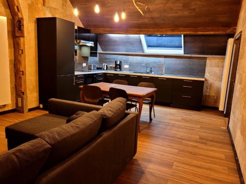 Kuchyň nebo kuchyňský kout v ubytování Chez Claude appartement cozy climatisé pour 4 personnes tout confort