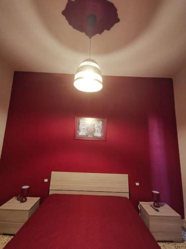 Ένα ή περισσότερα κρεβάτια σε δωμάτιο στο NA ZA ROSA - Casa Vacanze