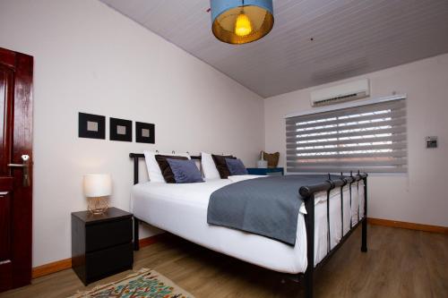 Posteľ alebo postele v izbe v ubytovaní Stunning 1-Bed House in Tema- Oheneba villa
