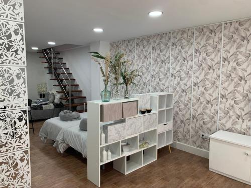 Ένα ή περισσότερα κρεβάτια σε δωμάτιο στο LOFT LA LUNA