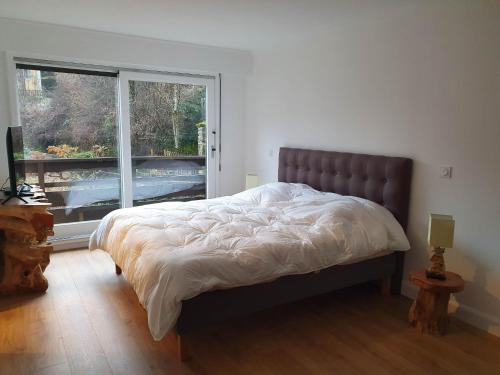 Postel nebo postele na pokoji v ubytování Appartement 150m2 - 5mn du téléphérique de l'Olympe - domaine des 3 vallées