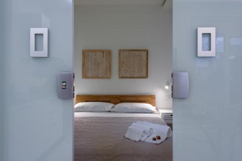 Posteľ alebo postele v izbe v ubytovaní CASA AZUL DELUXE E SUPERIOR