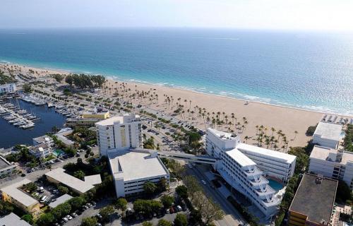an aerial view of a beach with buildings and people at B Ocean Resort Fort Lauderdale Beach in Fort Lauderdale