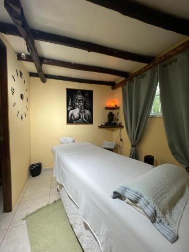 Una cama o camas en una habitación de Valle Paradise