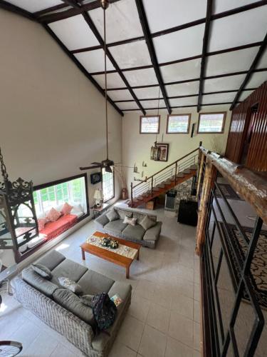 an overhead view of a living room with a staircase at Valle Paradise in Valle de Anton