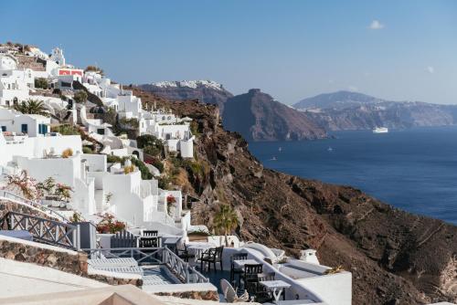 a view of the amalfi coast with white buildings at Aspa Caves in Oia
