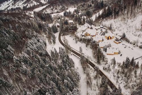 an aerial view of a ski resort in the snow at Complex Turistic Bucovina in Suceviţa