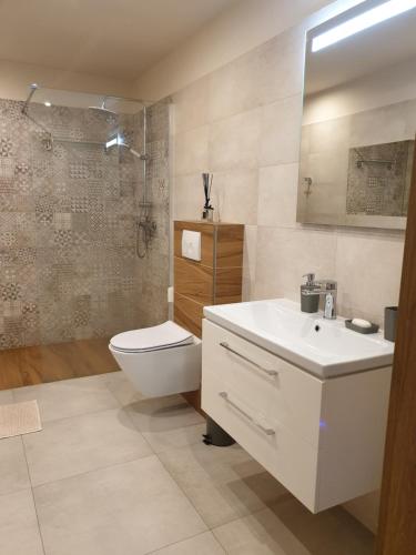 Kúpeľňa v ubytovaní Apartament pod Grojcem