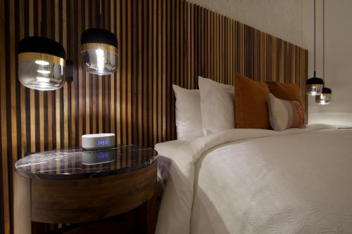 Ένα ή περισσότερα κρεβάτια σε δωμάτιο στο Nueve 25 Hotel Boutique