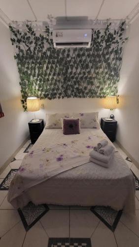 Een bed of bedden in een kamer bij Casa Luz Mi casa tu casa