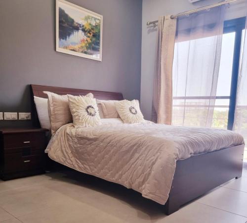Katil atau katil-katil dalam bilik di Modern 1-bed Seaside Flat Bijilo