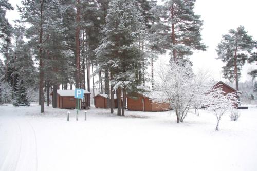 A house with a sauna at Arturs v zimě