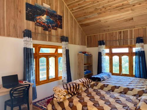 Postel nebo postele na pokoji v ubytování Bloomfield Farmhouse and Eco-Resort