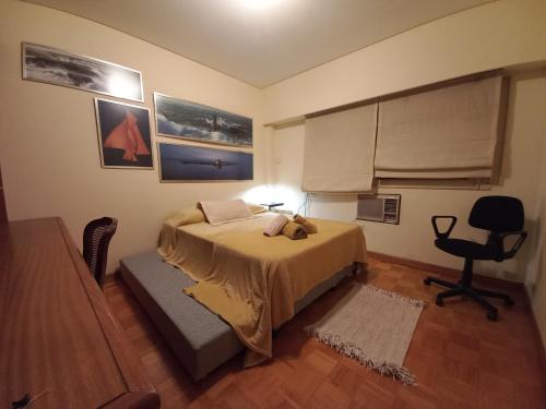 Voodi või voodid majutusasutuse Elegante alojamiento en pleno Recoleta toas