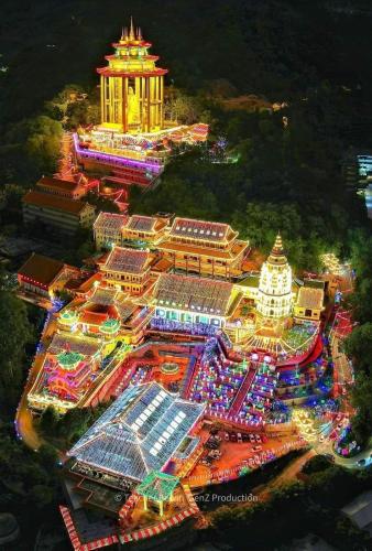 an aerial view of a city lit up at night at Room3#IG theme Bargainous#Shared Bathroom#2pax#2min Kek Lok Si in Ayer Itam