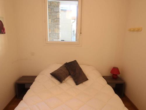 Posteľ alebo postele v izbe v ubytovaní Charmant T3 à Montauban-de-Luchon, 41m², véranda, jardin sud 58m², parking sécurisé - FR-1-313-219