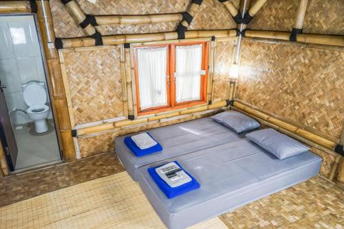 Una cama o camas en una habitación de INAGRO