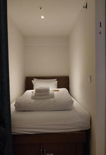 Postel nebo postele na pokoji v ubytování H HOSTEL Itaewon