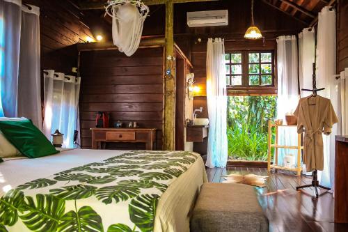 Ένα ή περισσότερα κρεβάτια σε δωμάτιο στο Glamping Mangarito